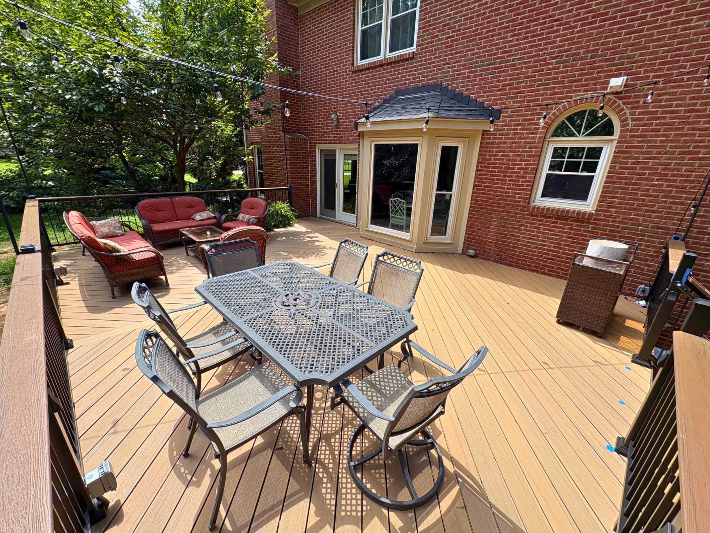 Custom composite deck on the back of a charlotte home.